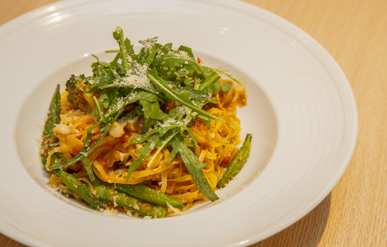 Handmade linguini with tomato-based amatriciana sauce