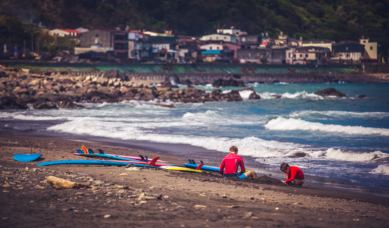 Honeymoon Bay beach with Daxi Village in the background
